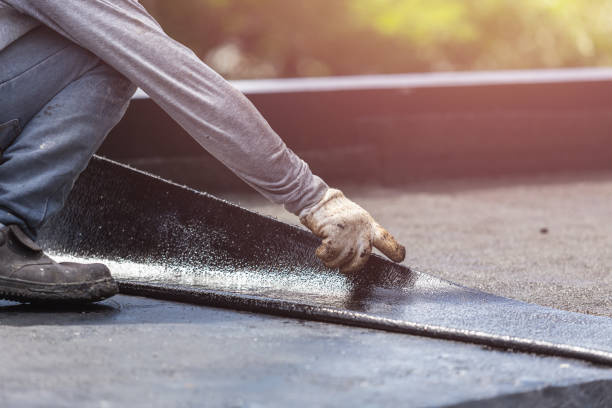 Professional Basement Waterproofing technician working in Junction City, KY